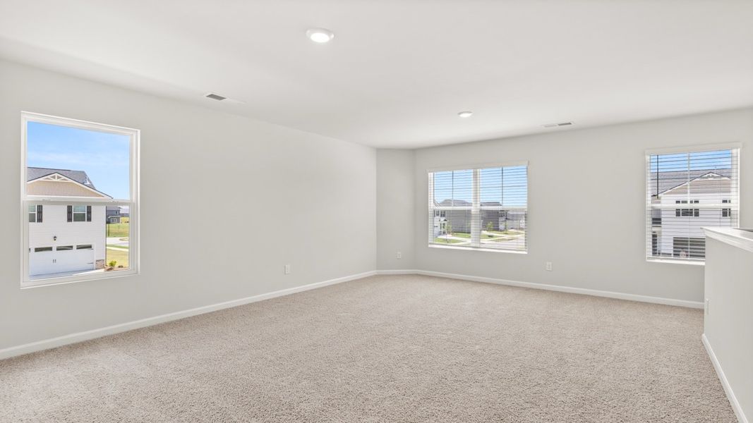 Representative unfurnished interior of a home built from the Elle by D.R. Horton in Preserve at Dove Creek, Statham (Image 21).