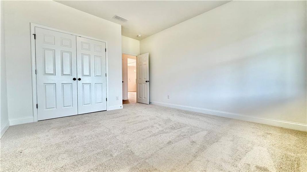 Spacious, unfurnished interior of a new home in Wehunt Meadows, Hoschton (Image 29).
