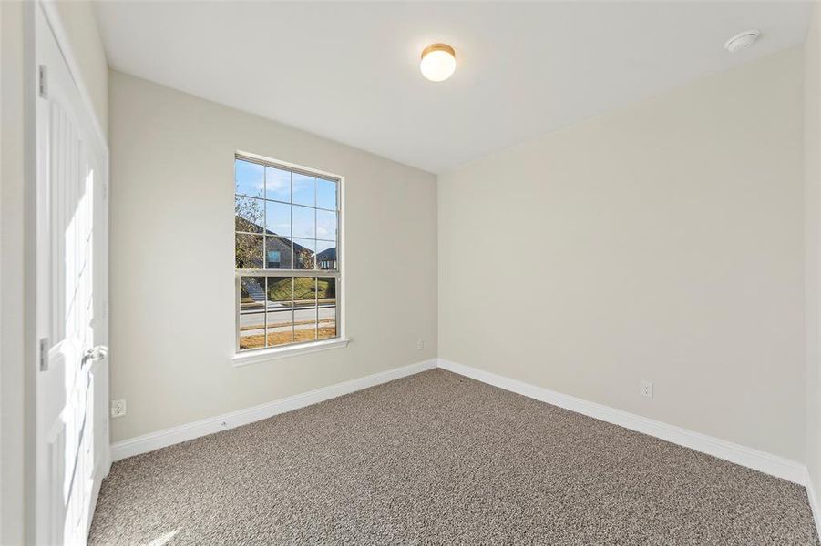 Empty room featuring carpet