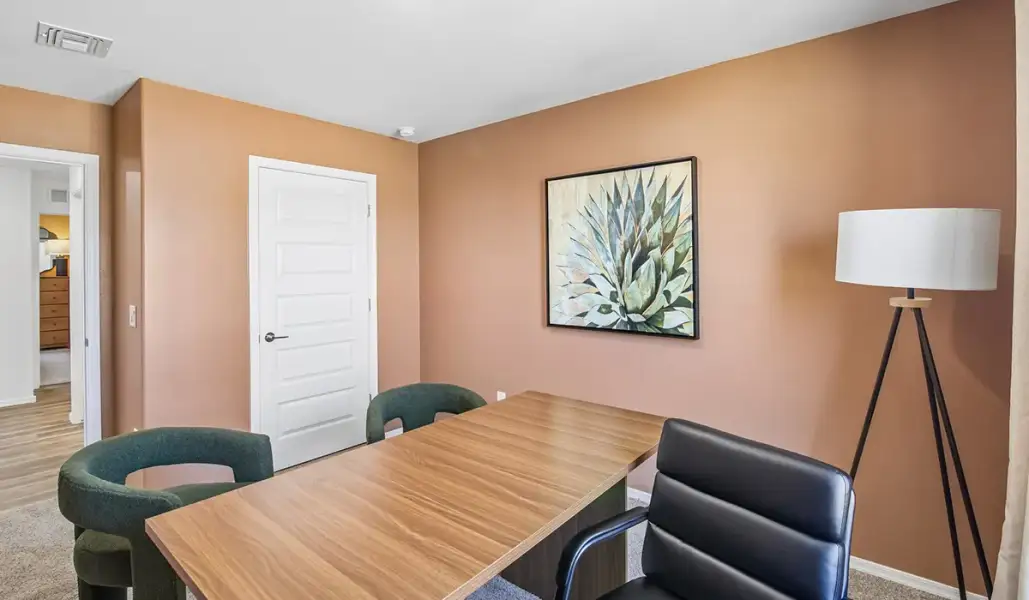 Representative furnished interior of a home built from the Bronco - T40B by D.R. Horton in Sorrel Ridge Estates, Tucson (Image 18).