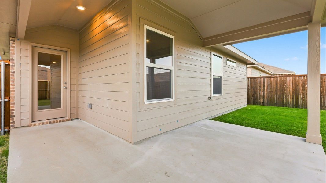 Exterior details and patio area of a home in Walden Pond, Forney (Image 3).