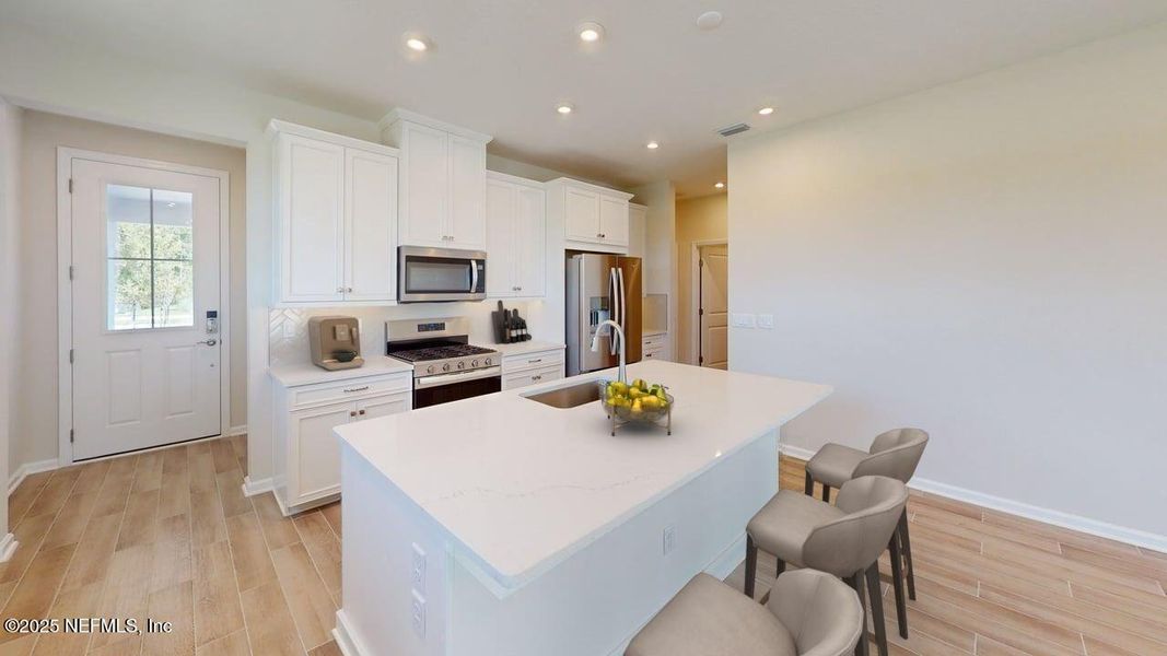 Furnished interior view inside a new home in RiverTown - WaterSong, St. Johns (Image 11).