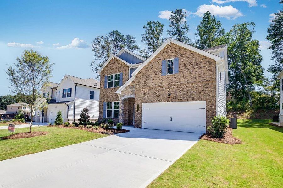 Front exterior of a new home in Bailey Fence, Dacula, GA, highlighting curb appeal (Image 21).
