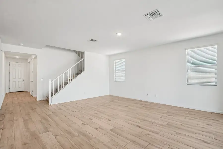 Great room. Finishes and options may vary by community.