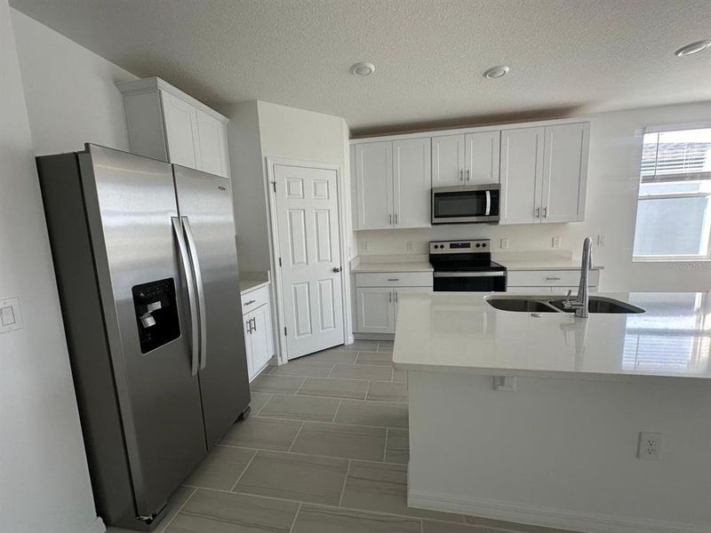 Furnished interior view inside a new home in , Winter Haven (Image 3).