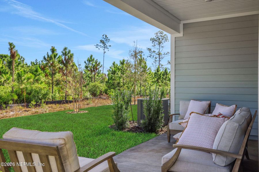 Exterior details and patio area of a home in Seminole Trace, Palm Coast (Image 28).