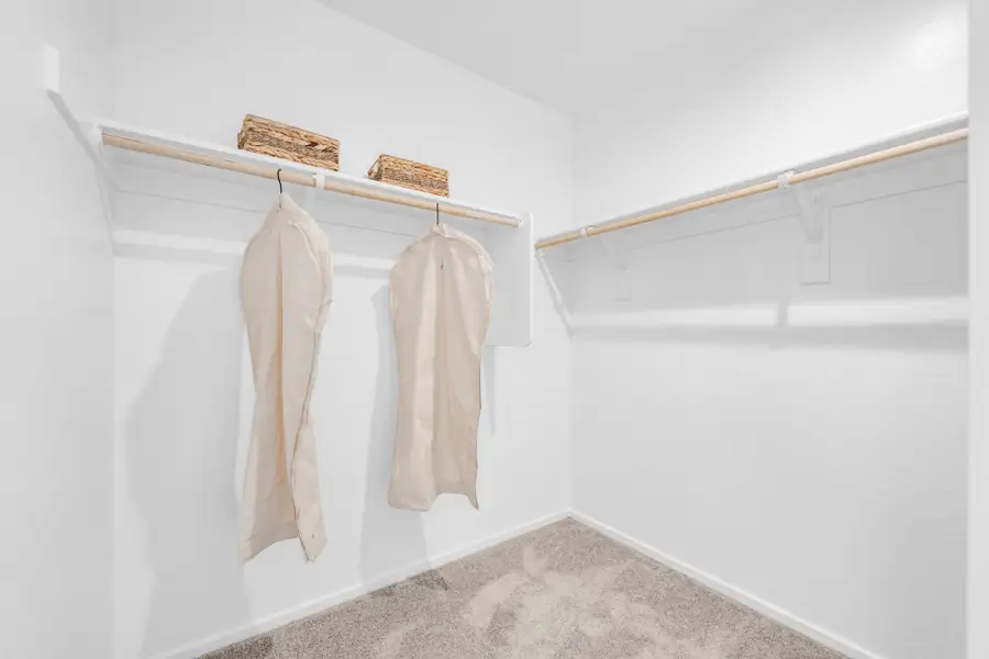 Primary Bedroom Walk-in Closet | Horizon | Wildera – Crest Series | New Homes in San Tan Valley, AZ by Landsea Homes Primary Bedroom Walk-in Closet | Horizon | Wildera – Crest Series | New Homes in San Tan Valley, AZ by Landsea Homes