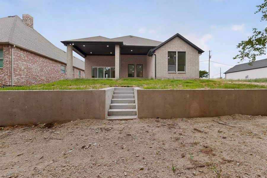 Exterior details and patio area of a home in , Whitney (Image 26). Exterior details and patio area of a home in , Whitney (Image 26).