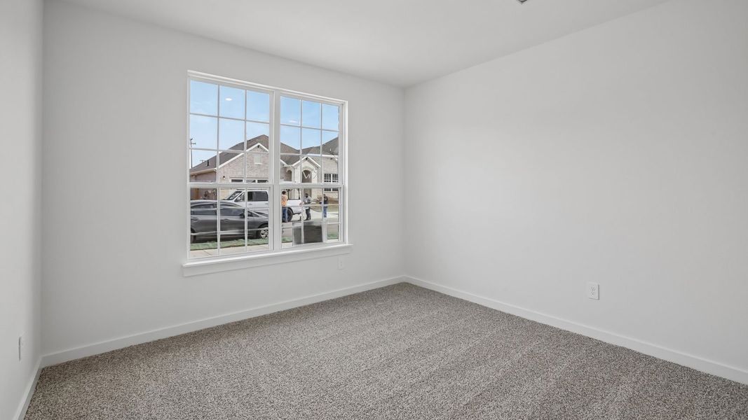 Spacious, unfurnished interior of a new home in Rosenbusch Ranch, Leander (Image 32).