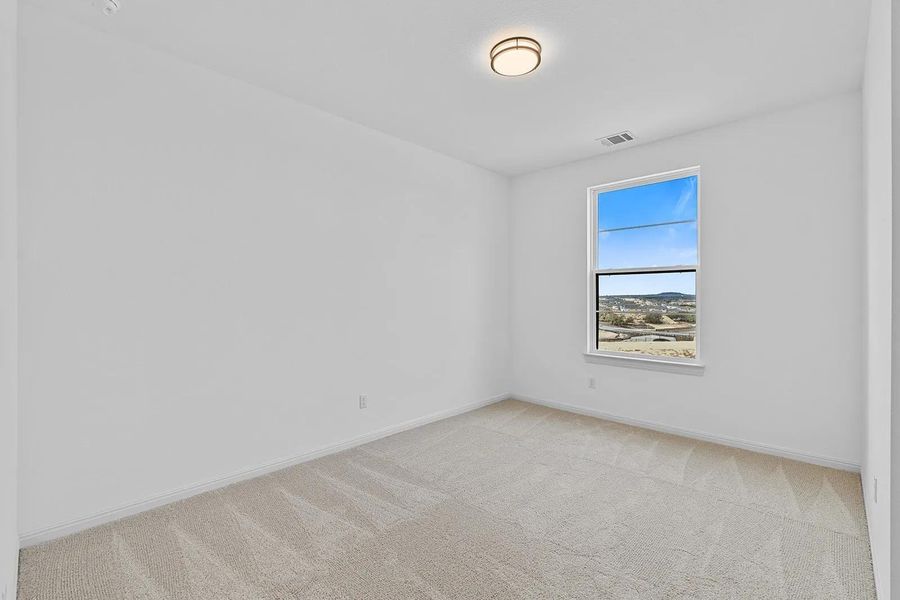 Spacious, unfurnished interior of a new home in Lariat - 70', Liberty Hill (Image 22).