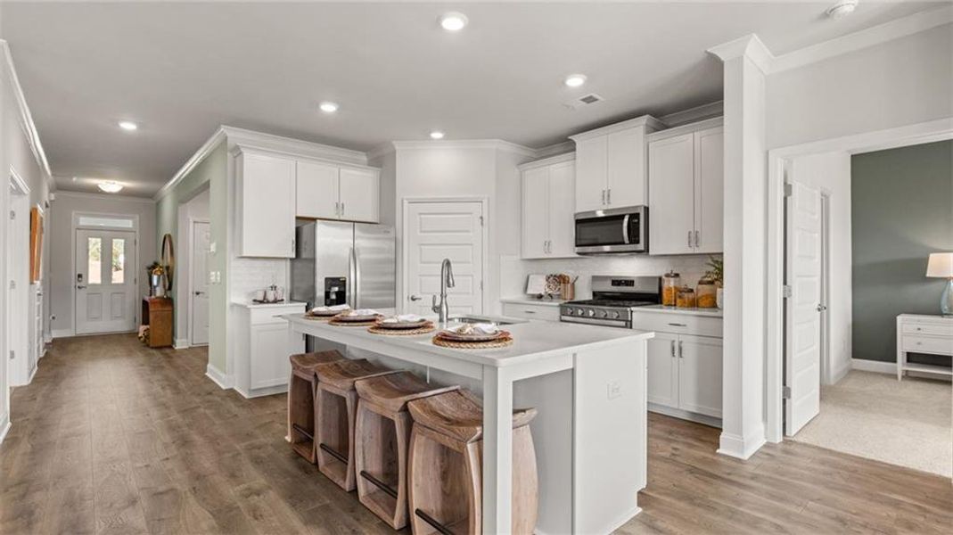 Furnished interior view inside a new home in Oak Ridge Meadows, Locust Grove (Image 4). Furnished interior view inside a new home in Oak Ridge Meadows, Locust Grove (Image 4).