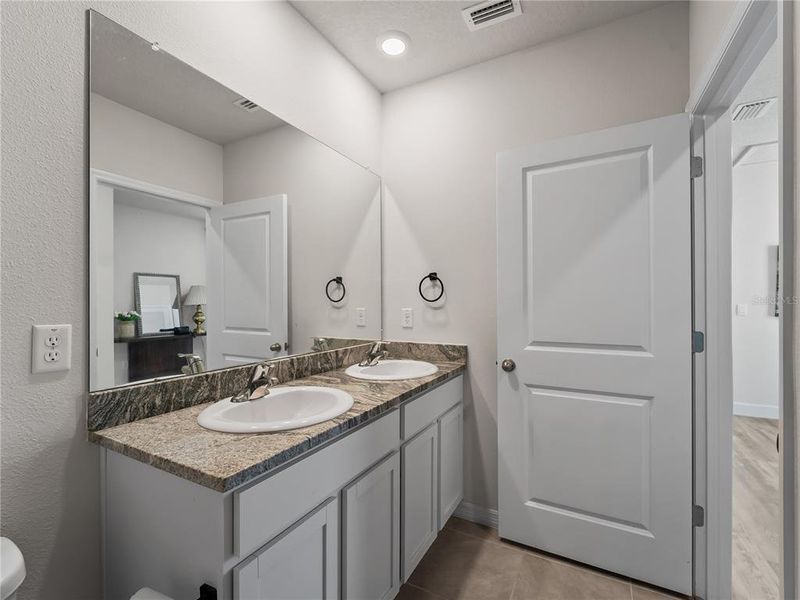 Furnished interior view inside a new home in Star Farms at Lakewood Ranch, Bradenton (Image 7).