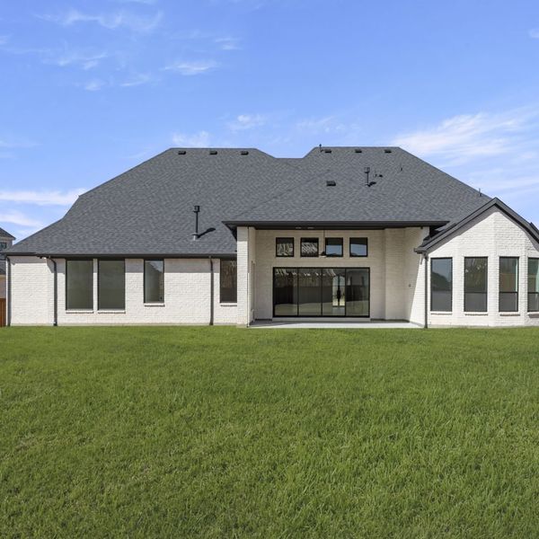 Exterior details and patio area of a home in Mustang Lakes, Celina (Image 37). Exterior details and patio area of a home in Mustang Lakes, Celina (Image 37).