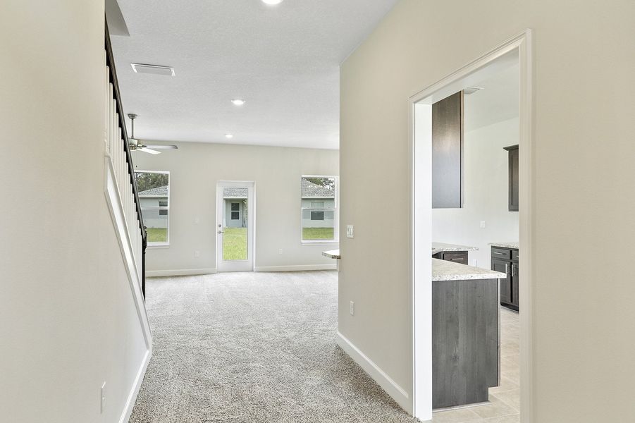 Representative unfurnished interior of a home built from the 2705 by Adams Homes in Winding Oaks, Weeki Wachee (Image 12).