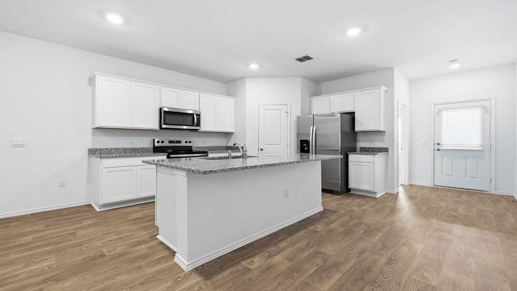 Representative furnished interior of a home built from the The Magnolia by D.R. Horton in Palomino, Manor (Image 6).