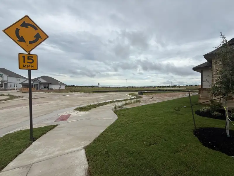 Front exterior of a new home in Southern Pointe, College Station, TX, highlighting curb appeal (Image 12). Front exterior of a new home in Southern Pointe, College Station, TX, highlighting curb appeal (Image 12).