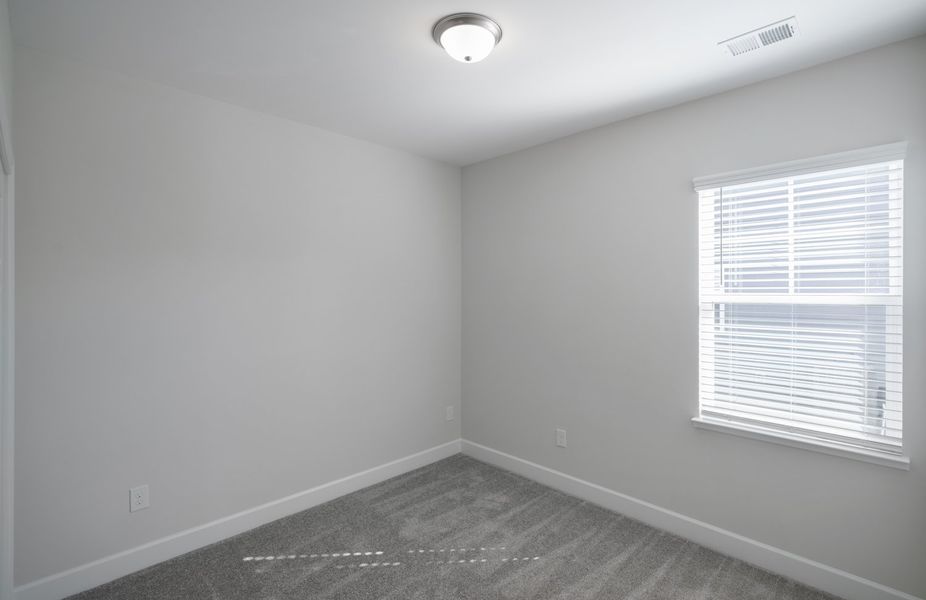 Representative unfurnished interior of a home built from the The Harper by Cothran Homes in Holly Ridge, Greenville (Image 25).