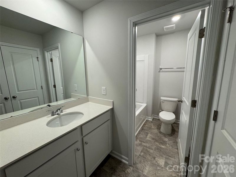 Furnished interior view inside a new home in McFarland Estates, York (Image 5).