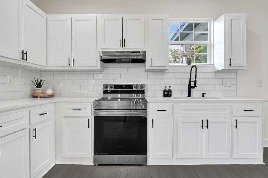 Ample cabinet space, and elegant finishes. Ample cabinet space, and elegant finishes.