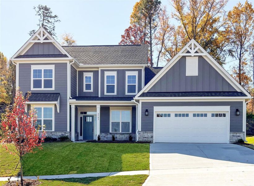 Front exterior of a new home in Red Hill, Concord, NC, highlighting curb appeal (Image 1).