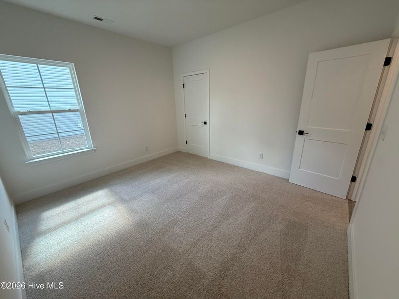 Spacious, unfurnished interior of a new home in Wood Creek Landing, Leland (Image 28). Spacious, unfurnished interior of a new home in Wood Creek Landing, Leland (Image 28).