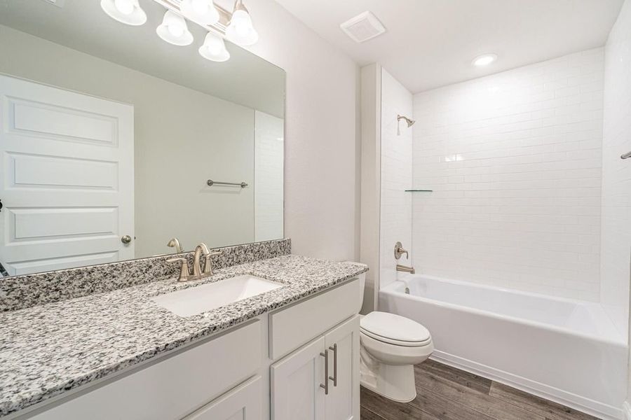 Furnished interior view inside a new home in Stonebrooke, Conroe (Image 7).