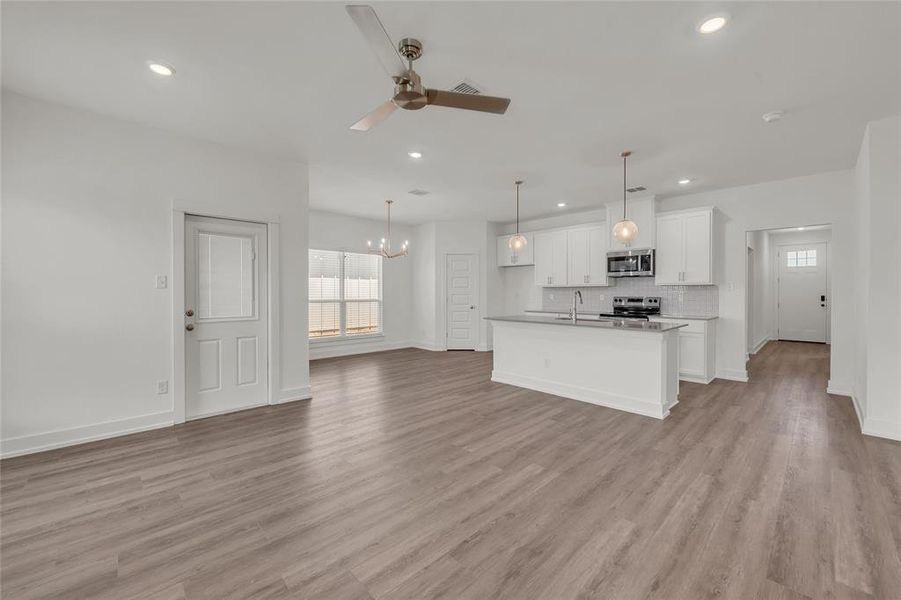 Please Note: These interior photos are not of the actual home but are of a completed one with a similar floor plan. Finishes, features, and layouts may vary.