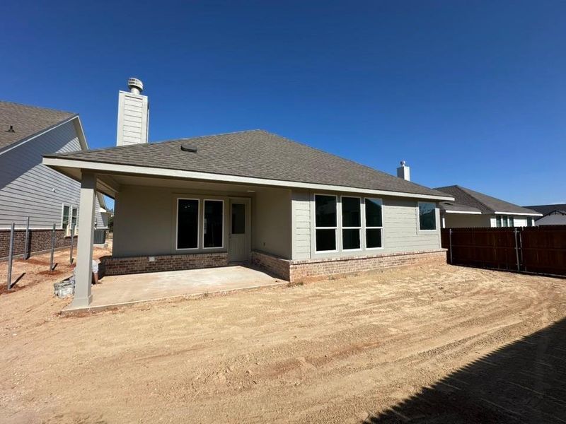 Exterior details and patio area of a home in Covenant Park, Springtown (Image 2). Exterior details and patio area of a home in Covenant Park, Springtown (Image 2).