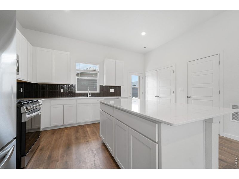 Furnished interior view inside a new home in Liberty Draw, Evans (Image 11).