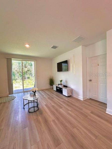 Spacious, unfurnished interior of a new home in Links Terrace, Daytona Beach (Image 9).