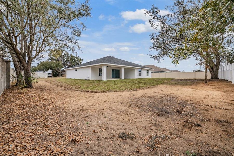 Exterior details and patio area of a home in , Dade City (Image 26).