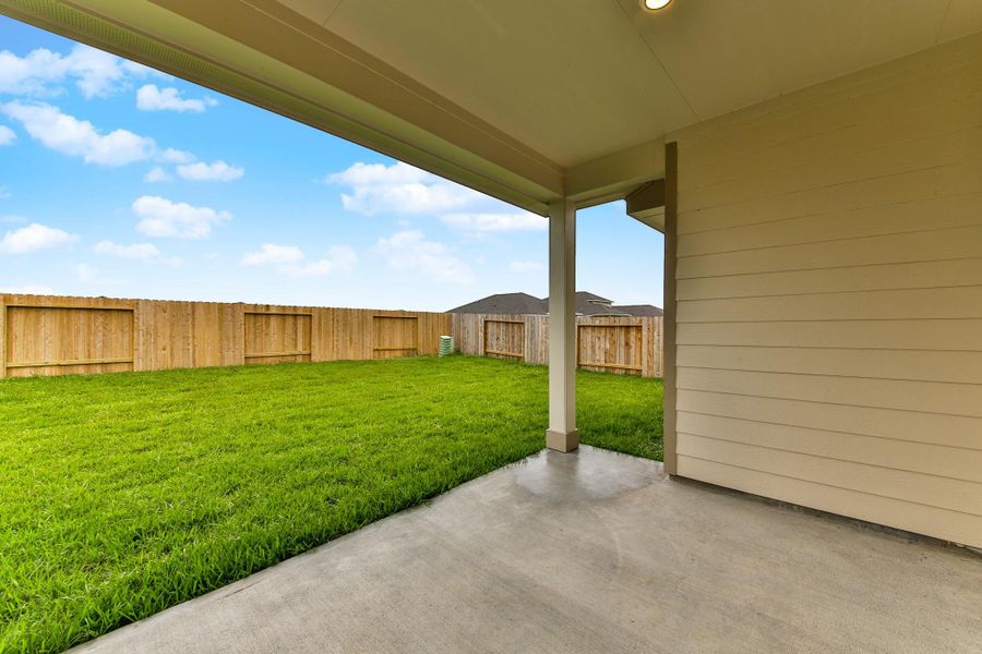 Sample photo of completed home with similar plan. As-built color and selections may vary.