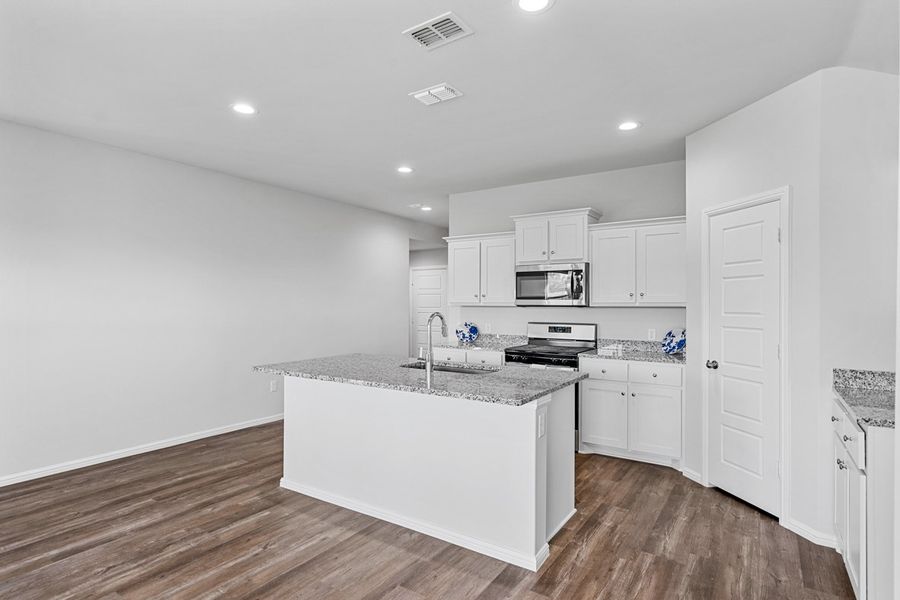 Representative furnished interior of a home built from the TEXAS CALI by D.R. Horton in Faculty Row, Abilene (Image 9).