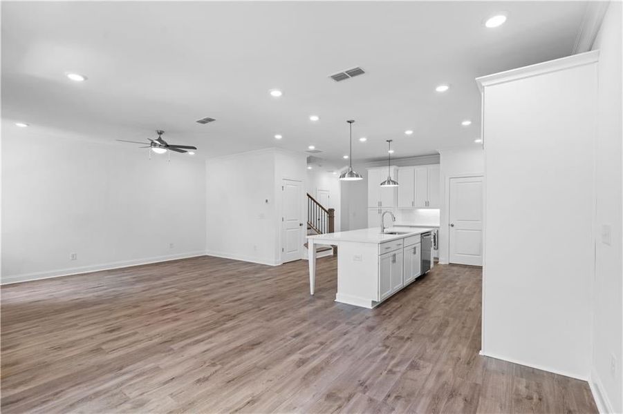 Family room, dining room, kitchen - all open concept living - brand new home - Move in Ready - Pictures represent a previously built home