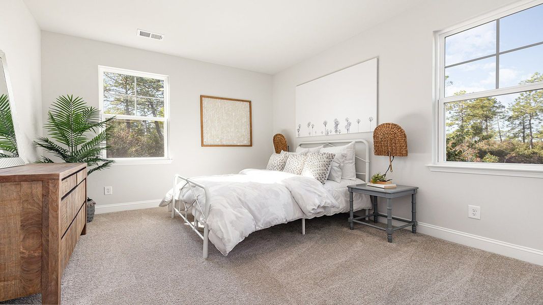 Furnished interior view inside a new home in Auberon Woods, Conway (Image 23).