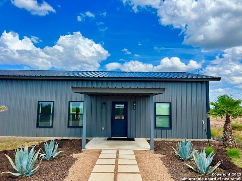 Exterior details and patio area of a home in , Pearsall (Image 16).