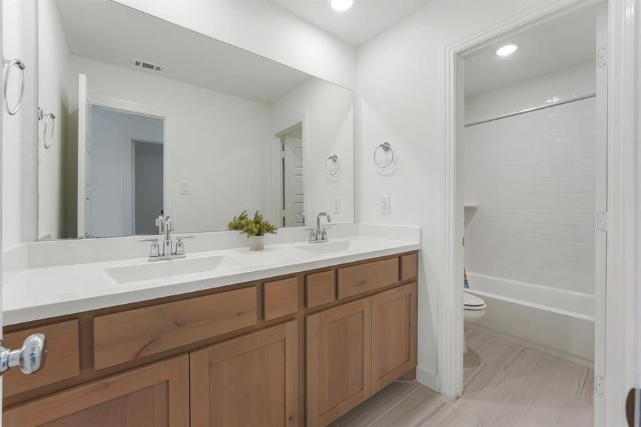 Furnished interior view inside a new home in Pecan Square, Northlake (Image 15).