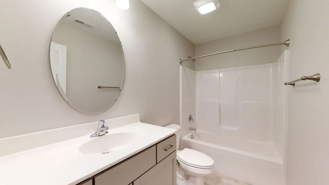 Representative furnished interior of a home built from the Kids 2 Car by JC Jackson Homes,LLC in Heritage Pointe, Newport (Image 6).