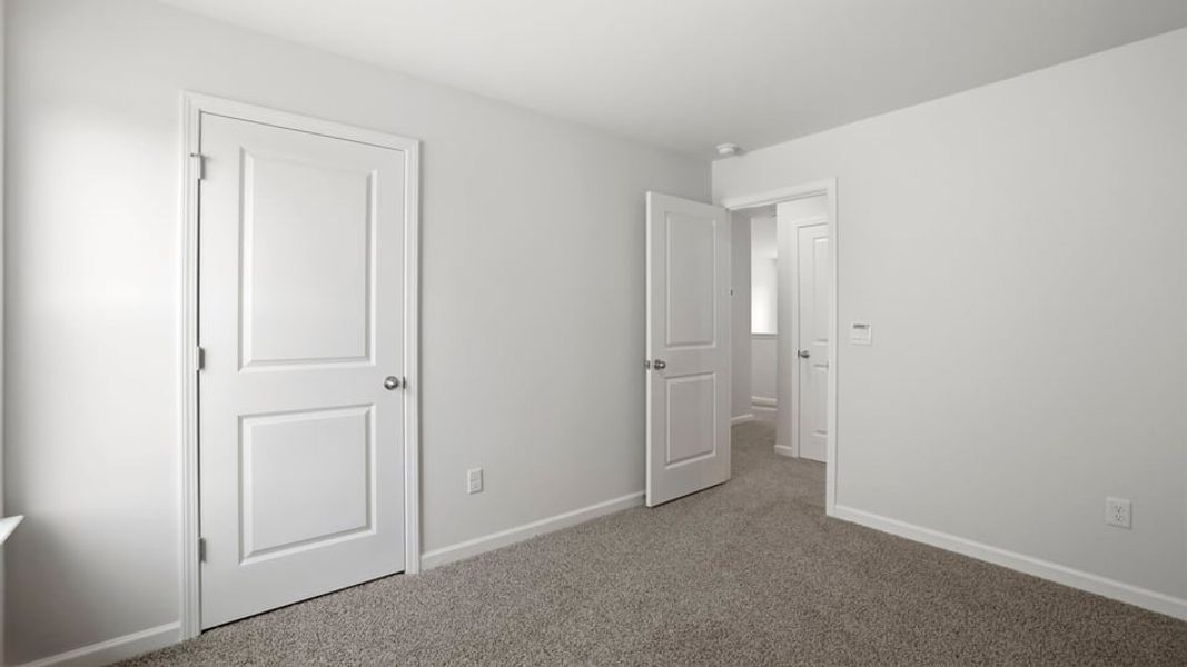 Spacious, unfurnished interior of a new home in Waverly Station, Greenwood (Image 25).