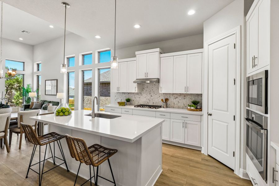 Furnished interior view inside a new home in 6 Creeks, Kyle (Image 5).