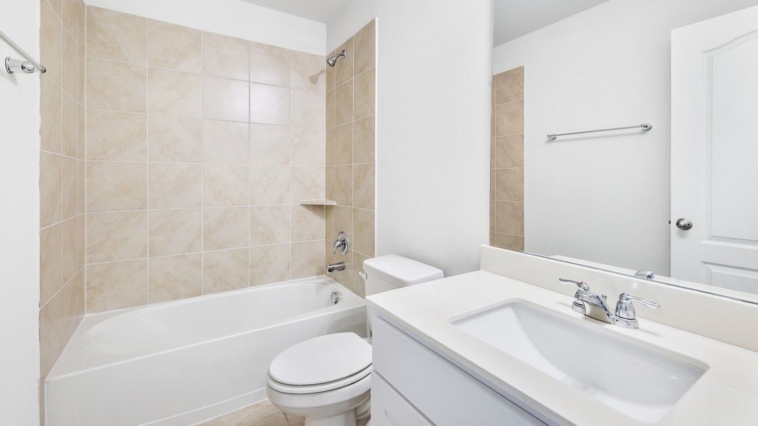 Representative furnished interior of a home built from the Meyerson by Brightland Homes in Sunterra, Katy (Image 10).