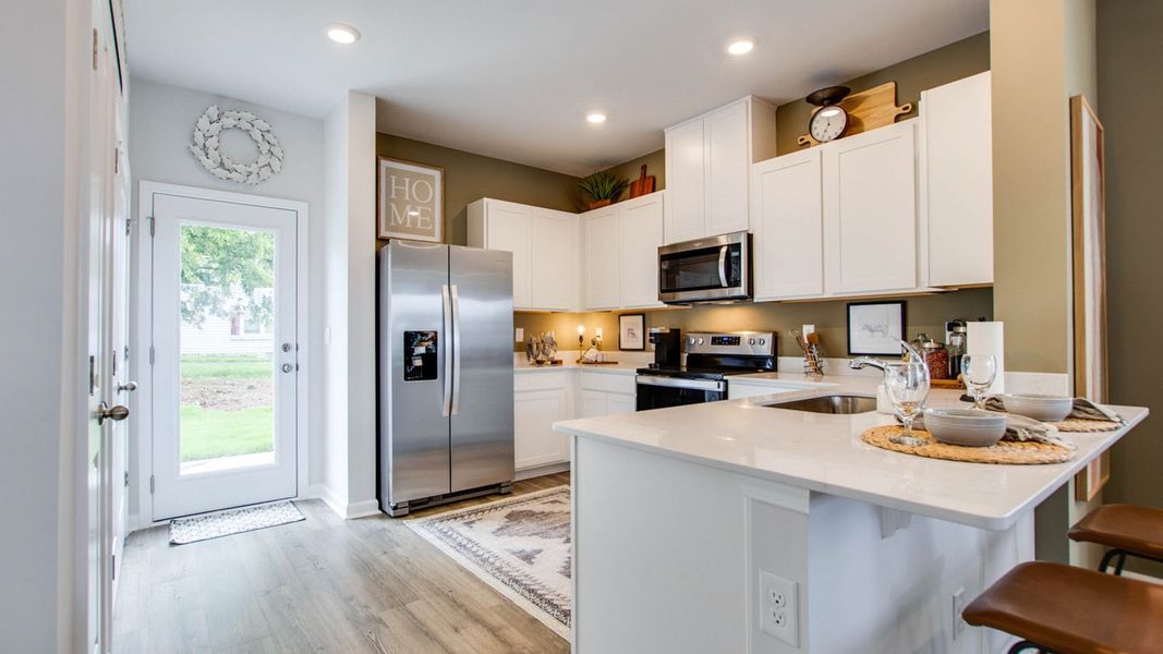 Representative furnished interior of a home built from the OWENS by D.R. Horton in Woodbridge Glen Townhomes, Lebanon (Image 11).