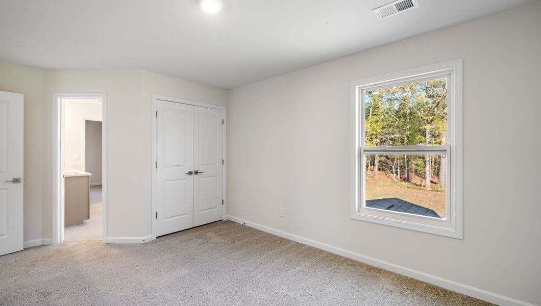 Representative unfurnished interior of a home built from the LONDON by D.R. Horton in Adams Glen, Greenville (Image 34).
