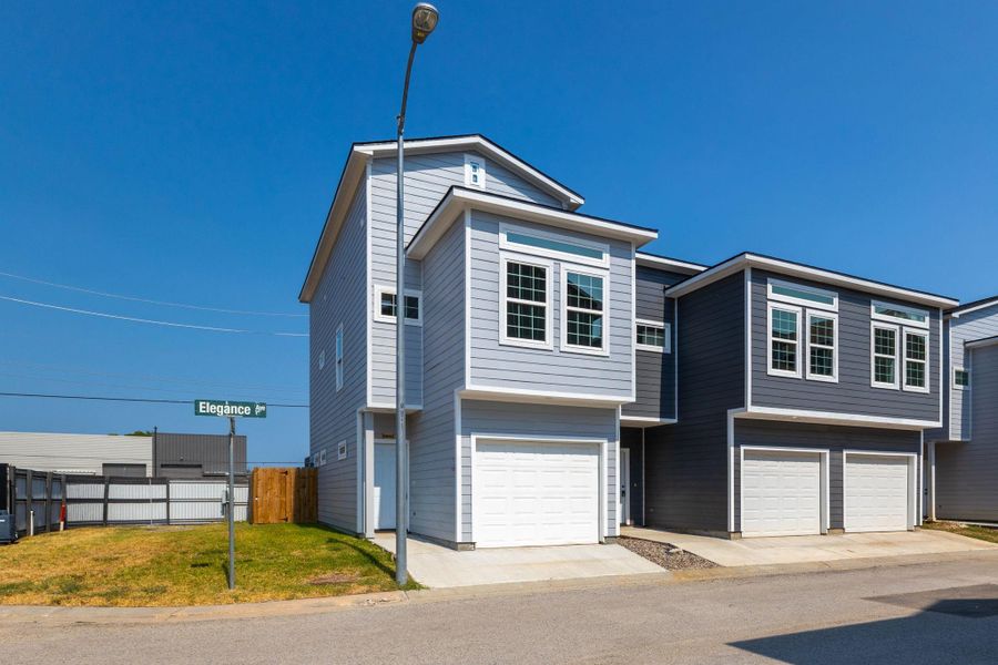 Front exterior of a new home in , Spring, TX, highlighting curb appeal (Image 23).