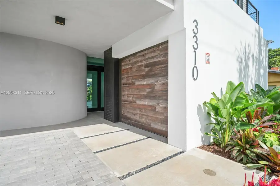 Exterior details and patio area of a home in , Miami (Image 29). Exterior details and patio area of a home in , Miami (Image 29).