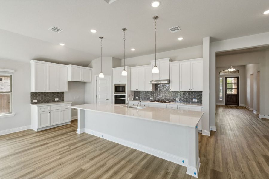 Furnished interior view inside a new home in Oaks of North Grove, Waxahachie (Image 8).