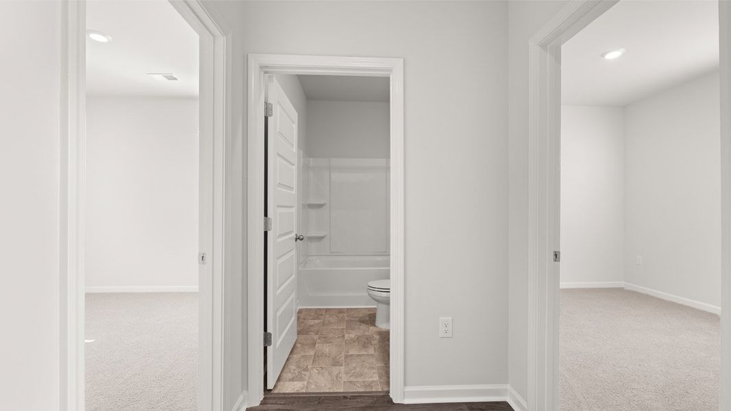 Representative unfurnished interior of a home built from the Sullivan by D.R. Horton in Byrd Village, Graniteville (Image 19).