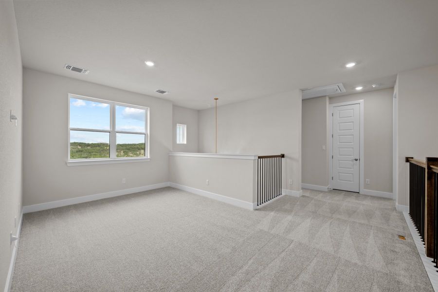 Representative unfurnished interior of a home built from the The Bluebonnet by David Weekley Homes in Kresston, Montgomery (Image 9).