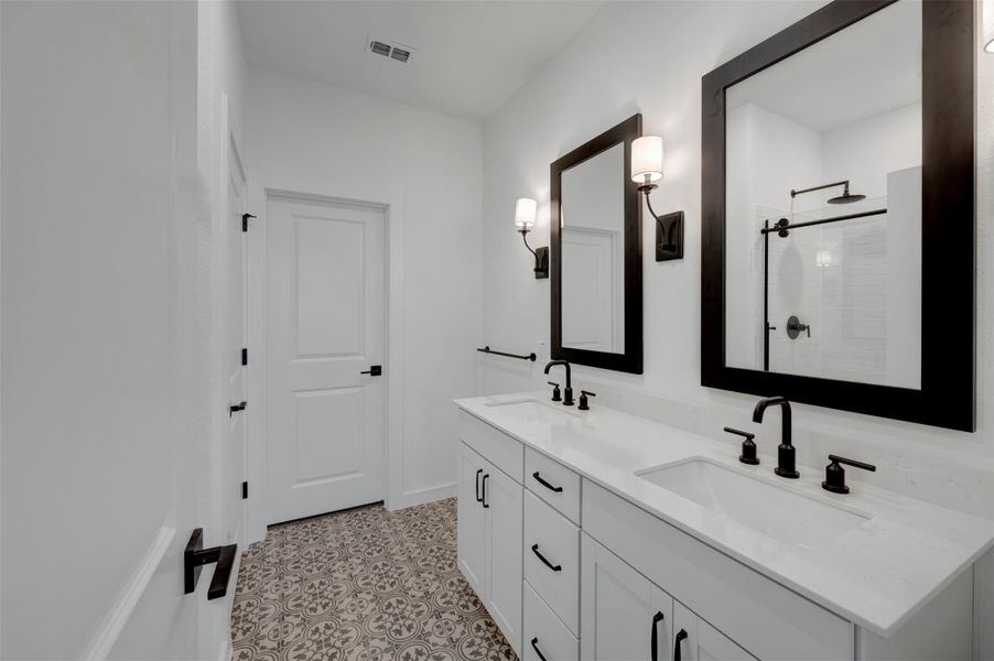 Luxurious primary bath (*Photo not of actual home and used for illustration purposes only.)