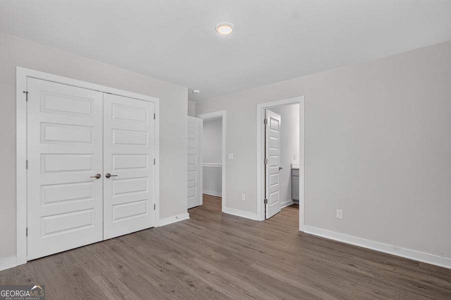 Spacious, unfurnished interior of a new home in The Cottages at East Lanier, Fayetteville (Image 16).